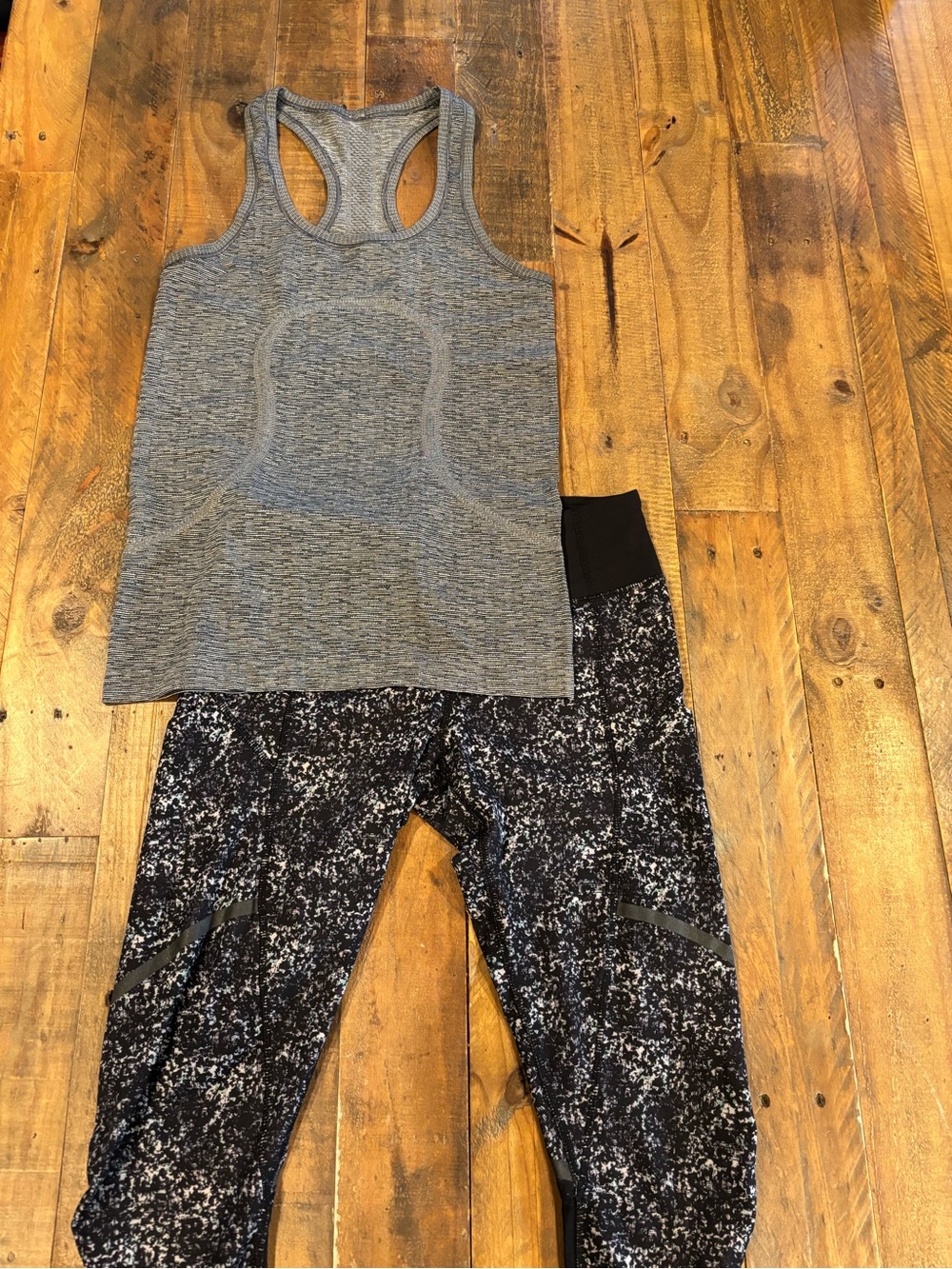 lululemon athletica gray racerback tank with black patterned leggings